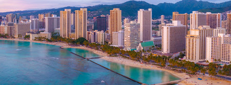 Aerial View of Waikiki Beach and Honolulu Skyline at Sunsetの写真素材