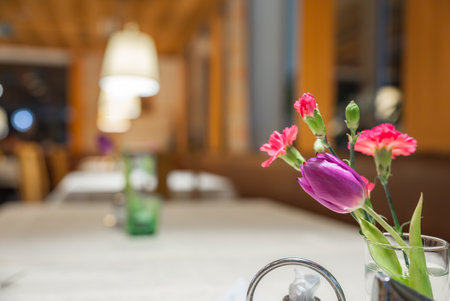 Dining Table with Floral Arrangementの写真素材