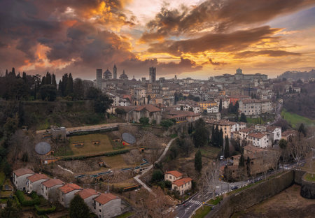 Old Town of Bergamo at Sunset with Towers and Domes in Viewの写真素材