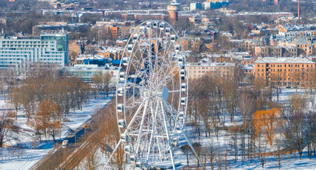 Winter Aerial View of Riga with Ferris Wheel and Water Towerの写真素材