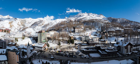 Aerial View of Cervino Town and Snowy Mountain Peaksの写真素材