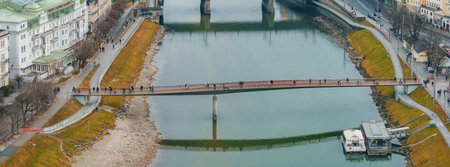 Aerial View of Pedestrian Bridge Over Salzach River in Salzburg