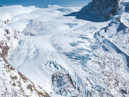 Aerial View of Snow Covered Glaciers and Peaks Near Matterhornの写真素材