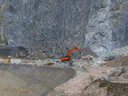 Excavator Operating at a Construction Site in the Austrian Alps