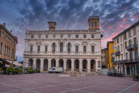 Piazza Vecchia and Palazzo Nuovo at Sunset in Bergamo, Italyの写真素材
