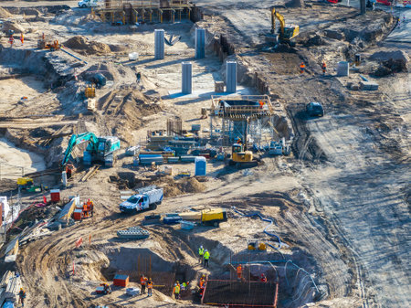 Construction Site in Riga with Roads, Bridges, and Heavy Machinery