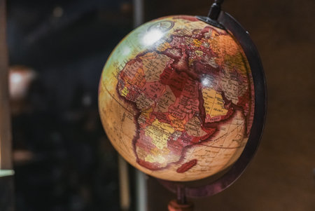 Vintage Globe Highlighting African Continent on Metal Stand