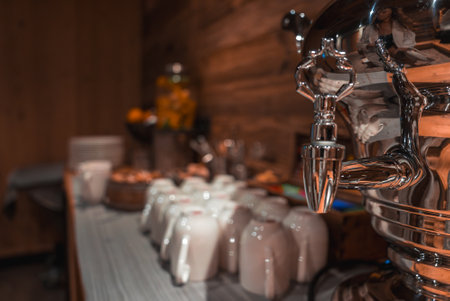 Polished Beverage Dispenser and Breakfast Setup in Alpine Retreatの写真素材