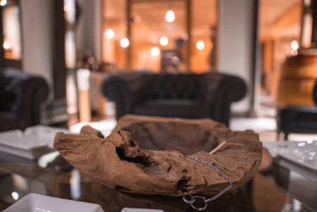 Luxurious Lounge with Rustic Centerpiece in Italian Alps Hotelの写真素材