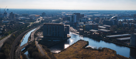 Aerial View of Manchester Cityscape with River and Skyscrapersの写真素材