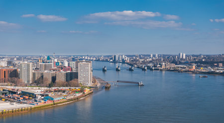 Aerial View of London with Thames Barrier and Urban Landscape
