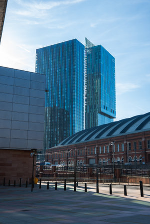 Manchester Cityscape with Deansgate Square Towers and Historic Building