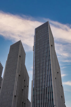 Modern Skyscrapers with White Facades and Narrow Windowsの写真素材
