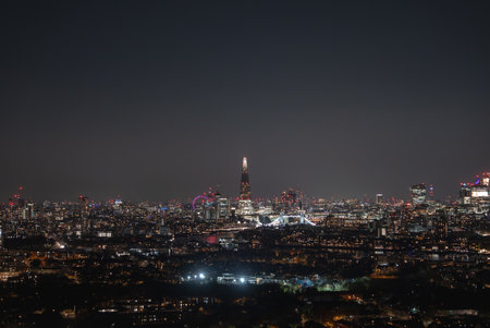 Nighttime London Cityscape Featuring The Shard and Tower Bridge