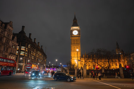 Big Ben and Houses of Parliament Illuminated at Night in Londonの写真素材