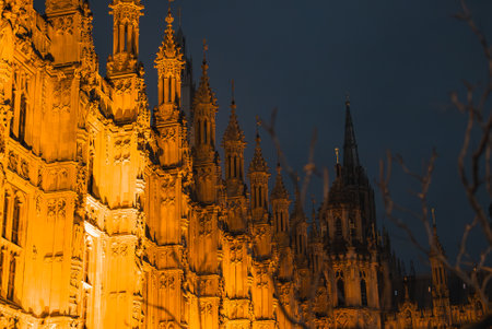 Palace of Westminster Illuminated at Night with Gothic Architectureの写真素材