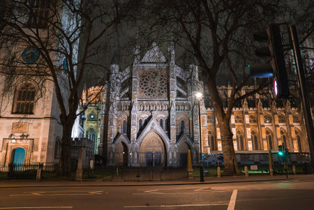 Westminster Abbey Illuminated at Night with Gothic Architectureの写真素材