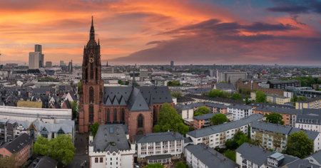 Aerial View of Frankfurt Cathedral at Sunset with Urban Skylineの写真素材