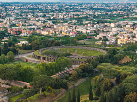 Aerial View of Pompeii Amphitheater and Modern Cityscape in Italyの写真素材