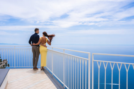 Couple on Terrace Overlooking the Tyrrhenian Sea in Amalfi