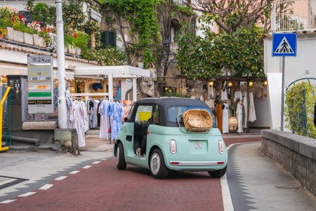 Vintage Green Car on a Brick Road in Positano, Italyの写真素材