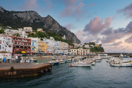 Marina Grande Waterfront and Harbor on Capri Island at Sunrise or Sunsetの写真素材