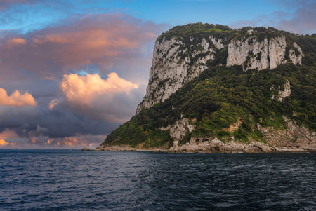 Coastal Cliff with Lush Greenery on the Island of Capri, Italyの写真素材