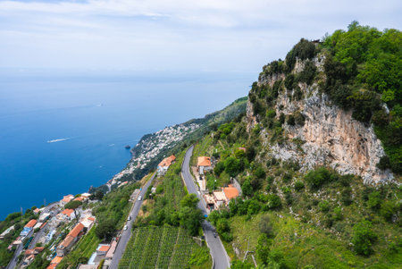 Coastal View of Amalfi Coast with Terraced Hills and Tyrrhenian Seaの写真素材