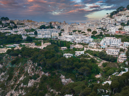 Hillside View of Capri Island with Whitewashed Buildings and Cliffsの写真素材