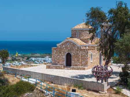 Stone Church with Tiled Dome and Sea View in Ayia Napa, Cyprusの写真素材