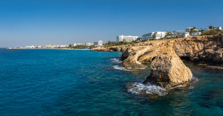 Coastal View of Ayia Napa with Luxury Hotels and Rugged Rocksの写真素材