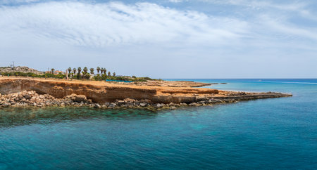 Coastal View of Rocky Cliffs and Turquoise Waters in Ayia Napa, Cyprusの写真素材