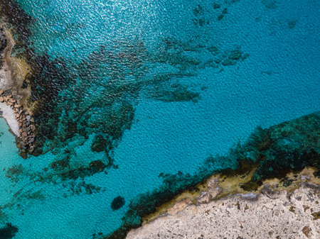 Aerial View of Turquoise Waters and Rocky Coast in Ayia Napa, Cyprusの写真素材