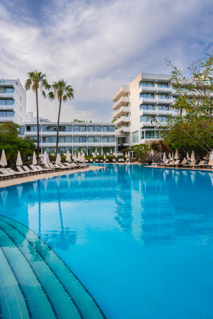 Luxurious Hotel Resort with Pool and Palm Trees in Cyprusの写真素材