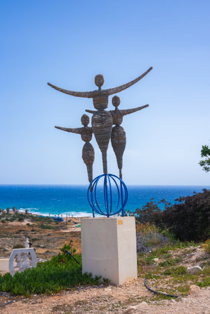 Abstract Human Figures Sculpture Overlooking Mediterranean Sea in Cyprusの写真素材