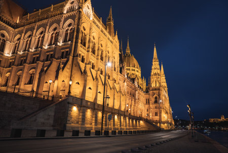 Hungarian Parliament Building Illuminated at Night in Budapestの写真素材
