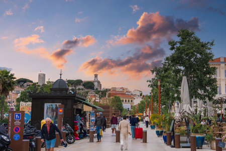 Lively Street Scene with Church of Our Lady of Esperance in Cannesの写真素材