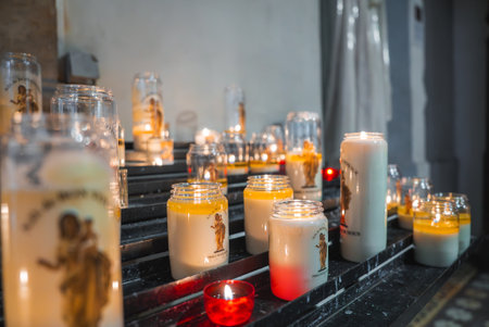 Lit Devotional Candles Inside a Cathedral in Cannes, Franceの写真素材