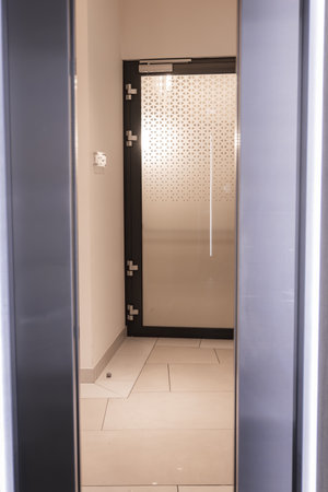 Modern Interior with Frosted Glass Door and Geometric Patternの写真素材