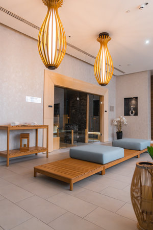 Luxurious Spa Interior with Wooden Furniture and Glass Doorの写真素材