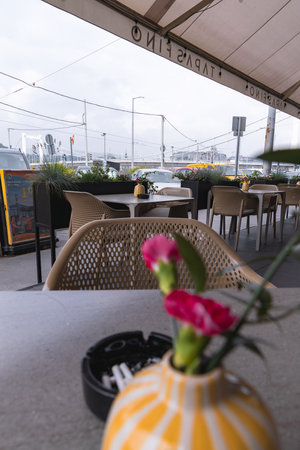 Outdoor Seating Area of Tapas Fino with Wicker Chairs and Tablesの写真素材
