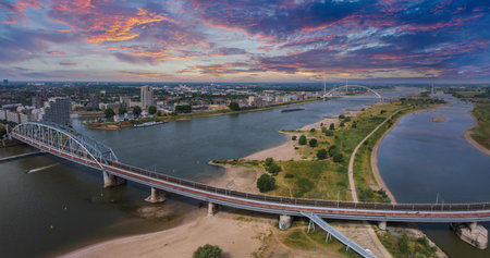 Aerial View of Waalbrug Bridge and Nijmegen Skyline at Sunset