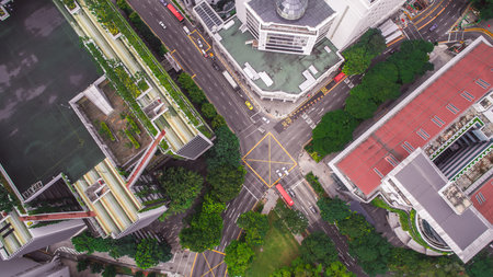 Aerial View of Singapore Intersection with Modern Architecture and Greenery