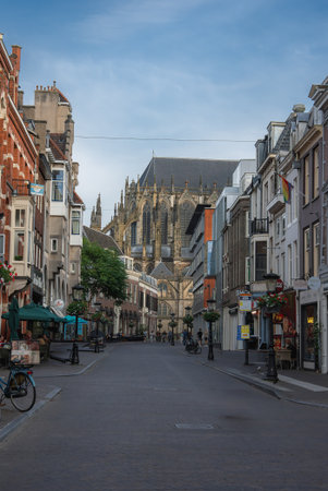 Charming Street in Utrecht with Dom Tower in the Backgroundの写真素材
