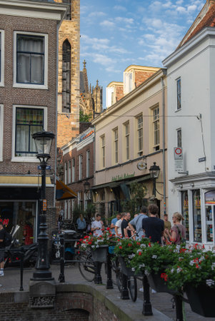 Street Scene with Dom Tower and Canal in Utrecht, Netherlandsの写真素材