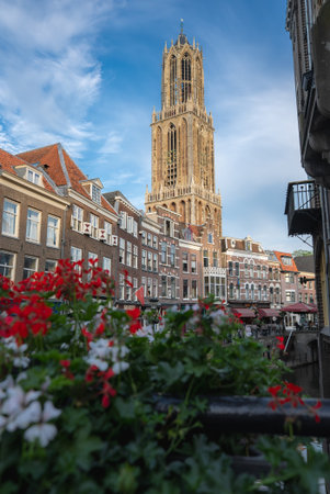 Dom Tower in Utrecht with Historic Buildings and Canal Viewの写真素材