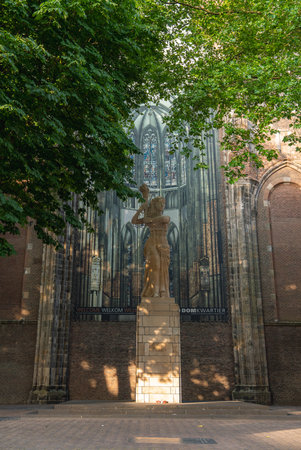 Statue and Mural Depicting Gothic Window in Domkwartier, Utrechtの写真素材
