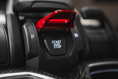 Close Up of Lamborghini Urus Center Console with Red Flip Cover