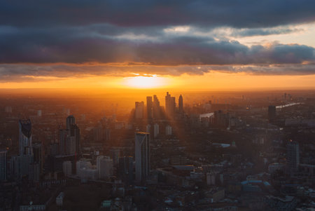 Sunset Over London Skyline Featuring Canary Wharf Skyscrapersの写真素材