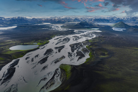 Aerial View of Braided River System and Volcanic Terrain in Iceland